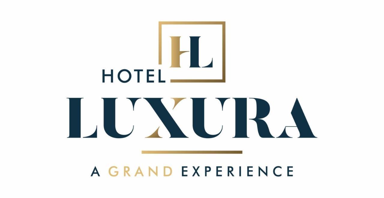 Hotel Luxura, Ahmadabad Zewnętrze zdjęcie